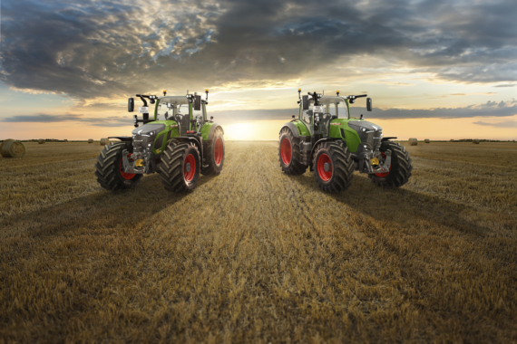 Stubble field with hay bales under  summer sky